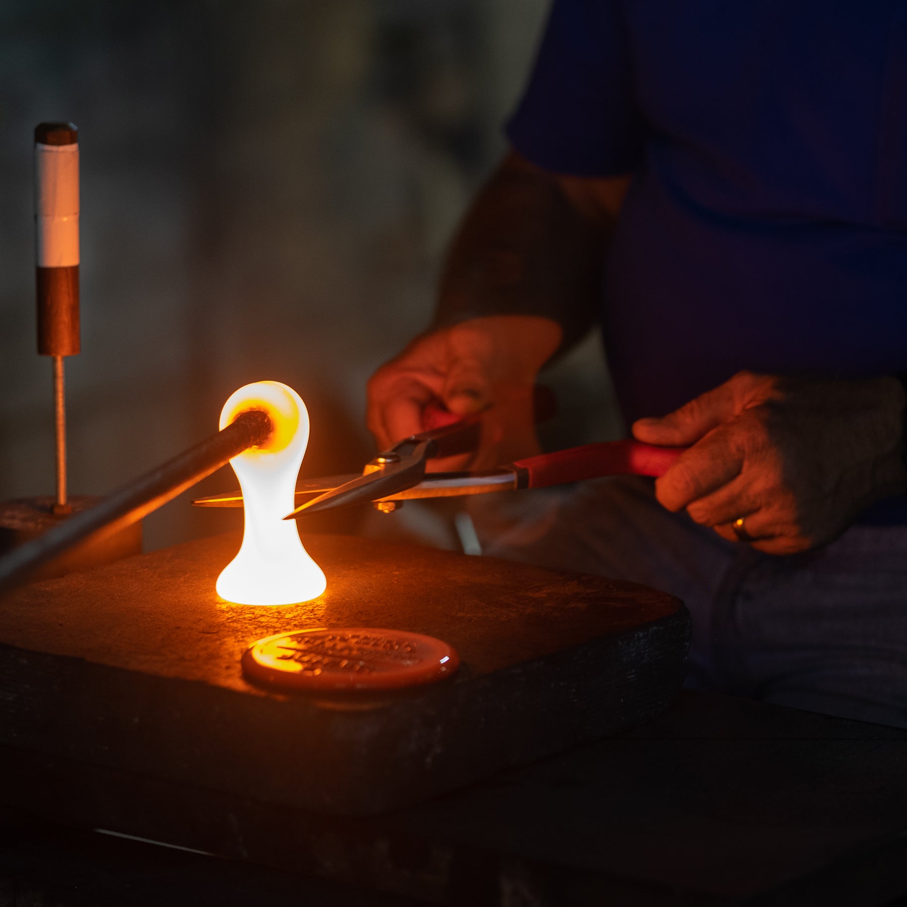 Suncatcher stamping shop working with molten glass